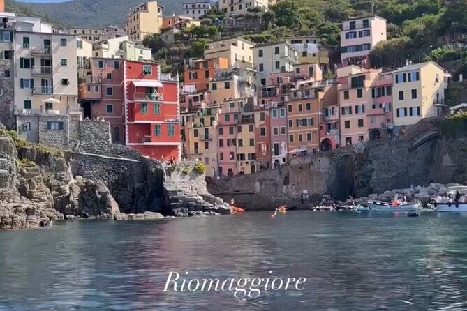 Cinque Terre boat tour - Manarola from the sea: rocks, angles, and photo time