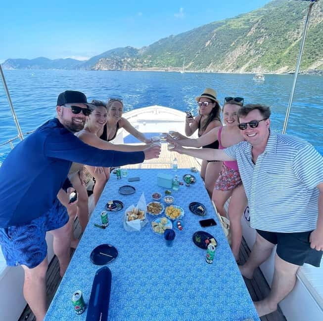 Cinque Terre boat tour with a traditional ligurian gozzo - Tapas aperitivo on the water: local flavors with Prosecco and beer