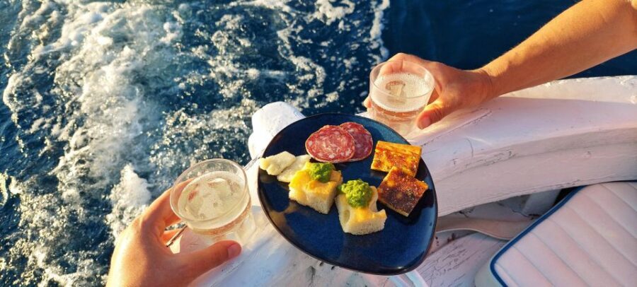 Cinque Terre: Sunset Boat Tour on Traditional Ligurian Gozzo - The 2.5-hour cruise along Cinque Terre’s coast