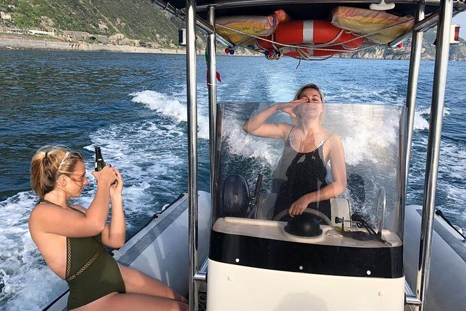 Private Boat Tour Along the Cinque Terre - Village views and the 19th-century train line you can spot from the water