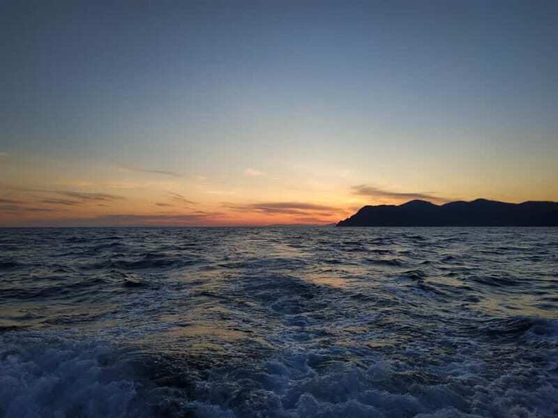 Riomaggiore: Cinque Terre Sunset Tour with Wine & Focaccia - Stop 2: All five Cinque Terre villages from the sea