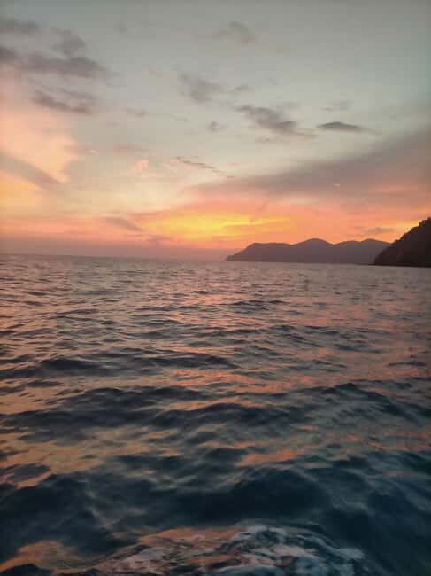 Vernazza: sunset cruise... 5terre Cruise..swim snorkeling... - Sunset Aperitif on the Boat: Focaccia, Local Wine, and a Slower Pace